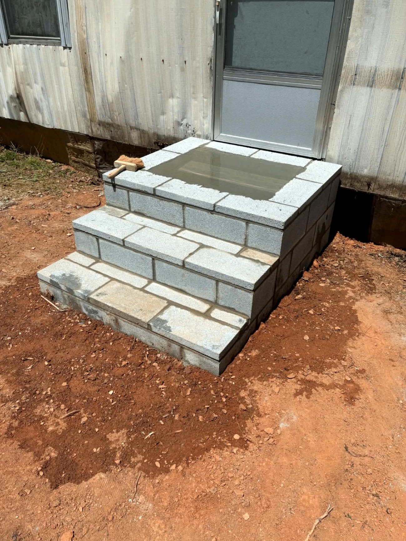 Custom masonry steps and entry landing